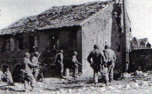 US soldiers clear farmhouses