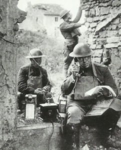 US communications detachment with a field telephone