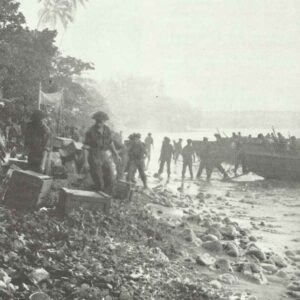 New Zealand troops of the second wave of landings unload provisions from LPCs on Treasury Island