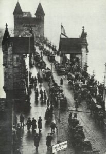 Return of German troops over the Rhine bridge near Bonn.