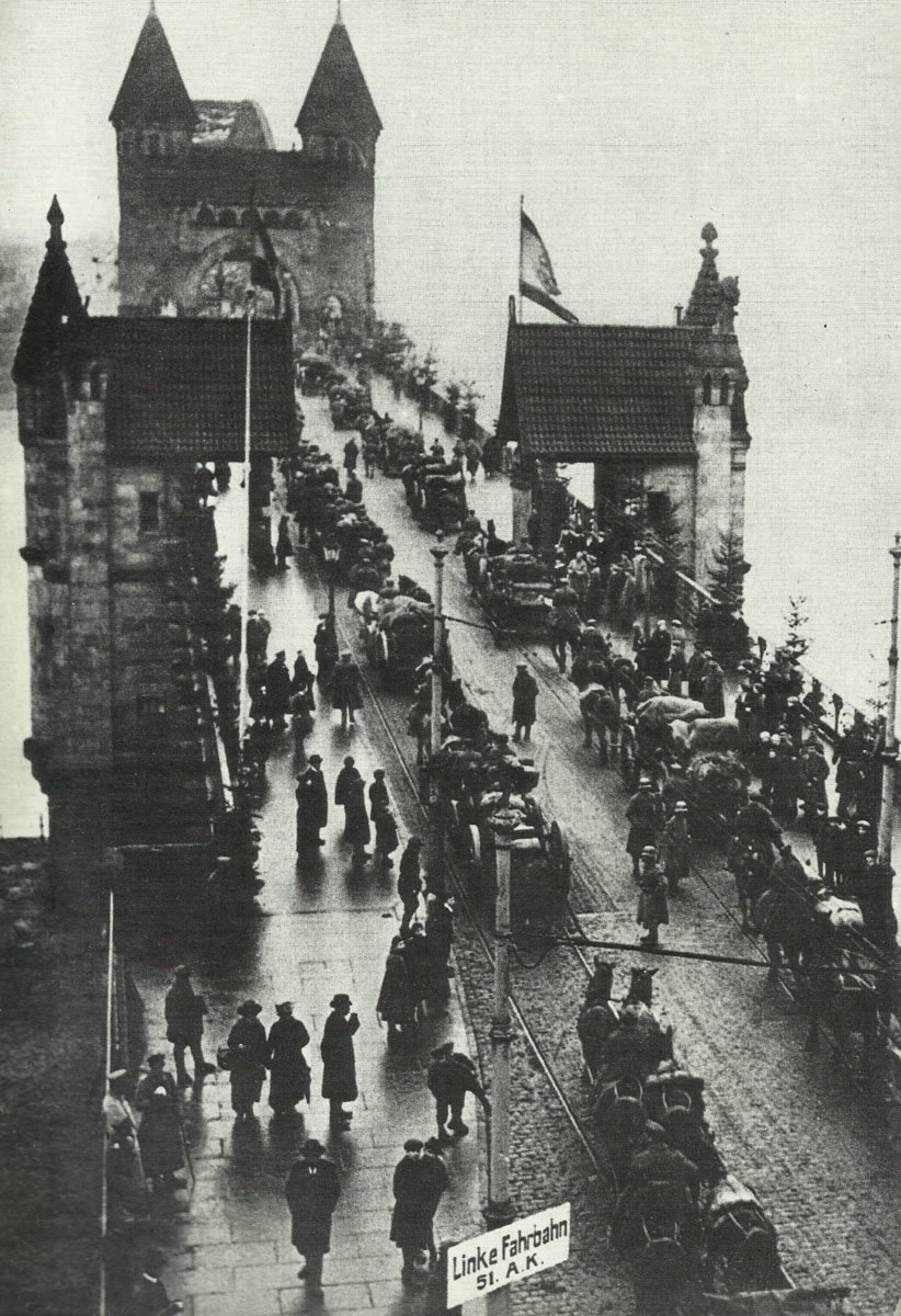 Return of German troops over the Rhine bridge near Bonn.