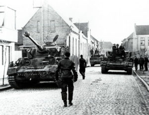 Panzer IV of the 'HJ' in the streets of Caen 