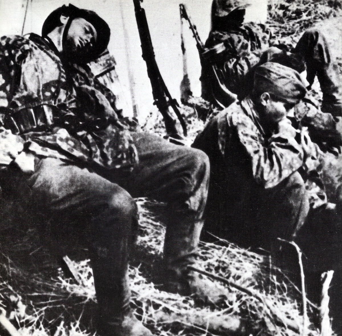 Completely exhausted soldiers of the Waffen-SS